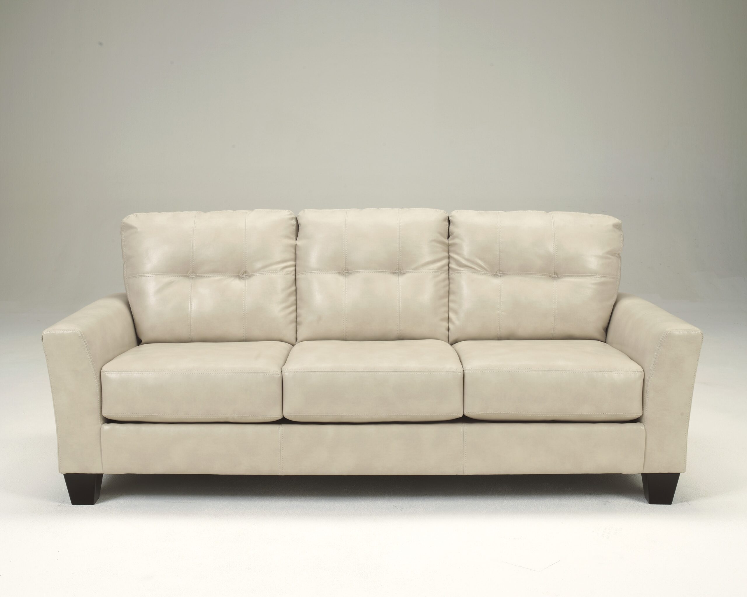 off white leather tufted sofa
