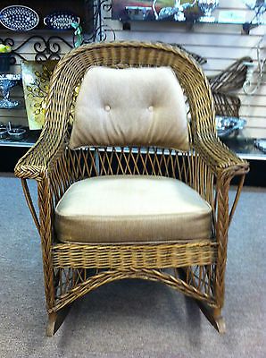 GORGEOUS ANTIQUE WICKER ROCKING CHAIR (RATTAN MANUFACTURING CO .