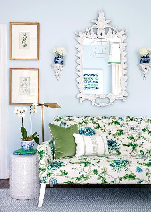 White Ornate Mirror with Green and Blue Chintz Sofa - Transitional .