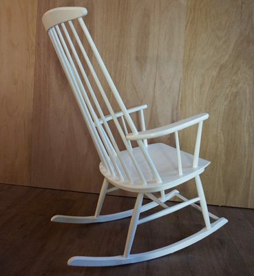 Vintage Mademoiselle High-Back Rocking Chair by Ilmar Tapiovaara .
