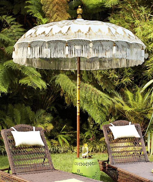 Adorn your patio with a spectacularly ornamented Balinese Umbrella .