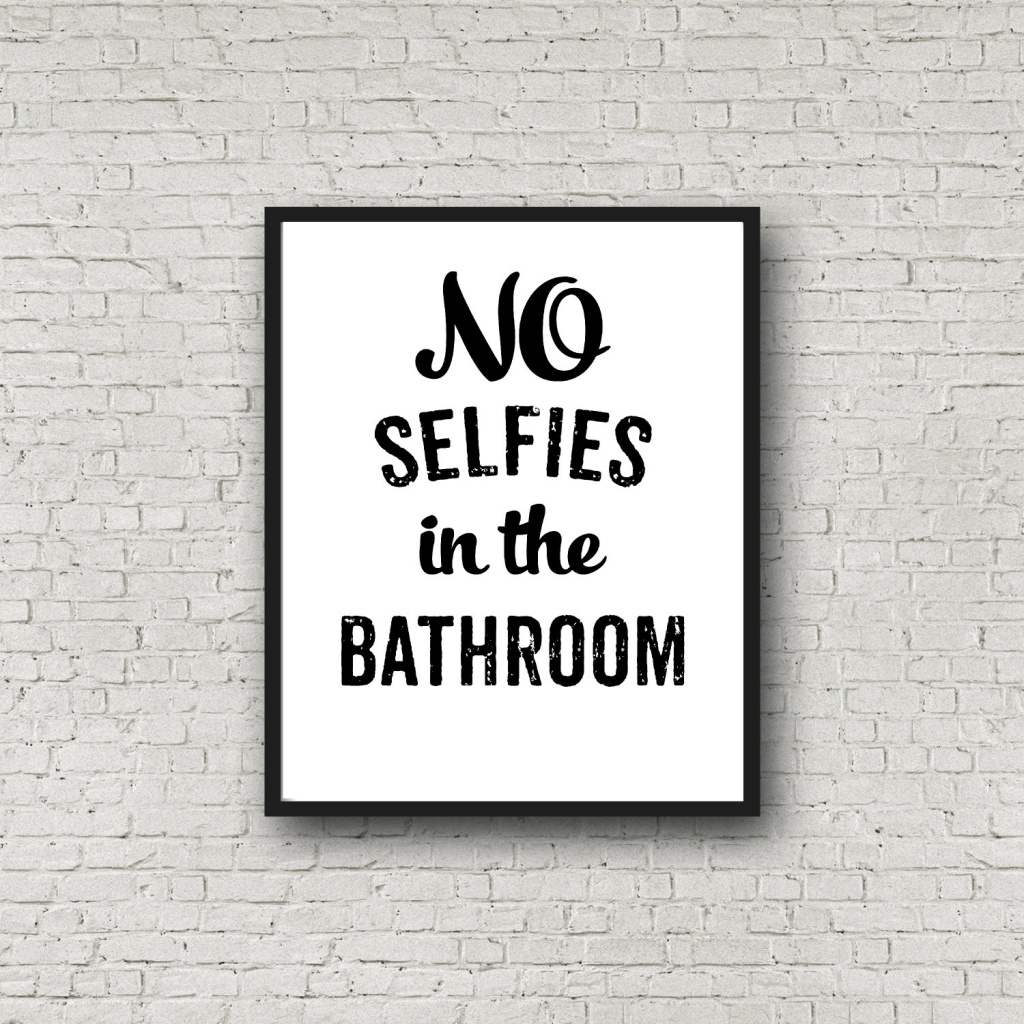 Satirical bathroom sign