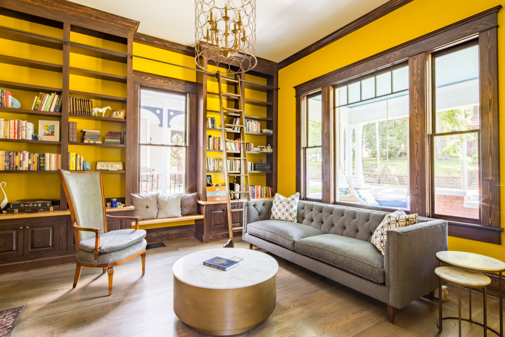 Living room with floor-to-ceiling bookshelf