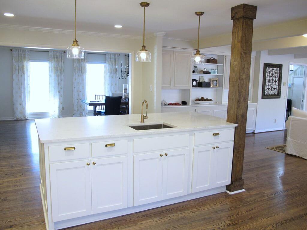 Wooden beams as kitchen island posts