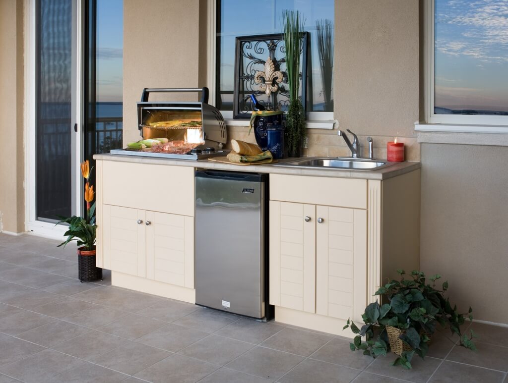 Outdoor kitchen with minimalist cupboard