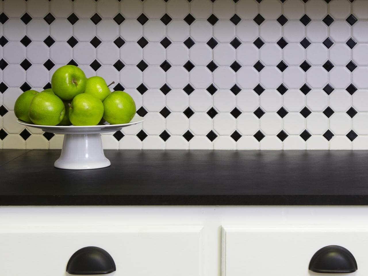 Beautiful kitchen rear wall with black and white tiles