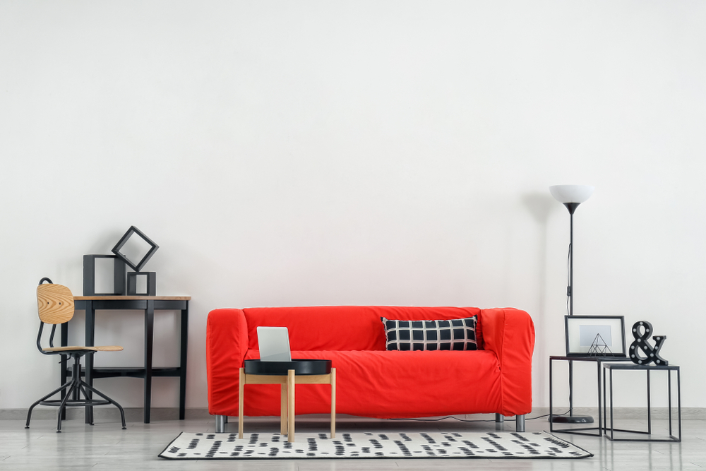 Fresh, red sofa in the mini living area