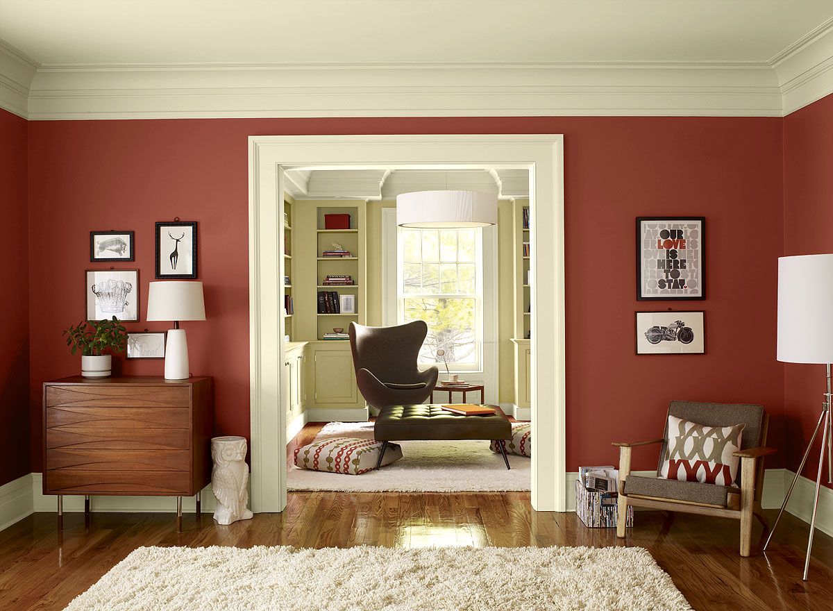 Dark wooden floor in a red living room
