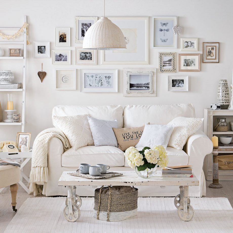 Wall art with framed family pictures.  Source: idealhome.co.uk