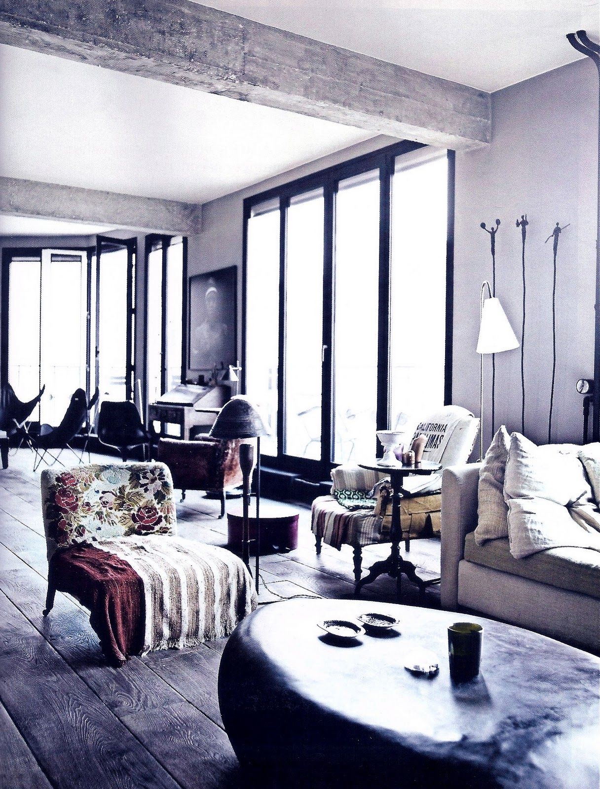 Industrial living room with metal windows.  Source: Pinterest
