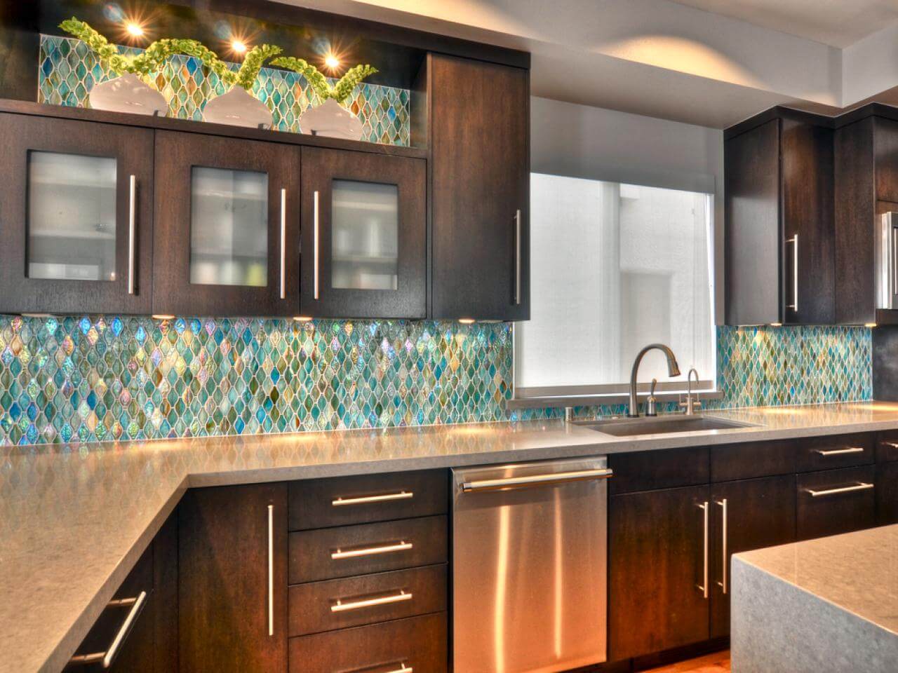Lively kitchen back wall with mosaic