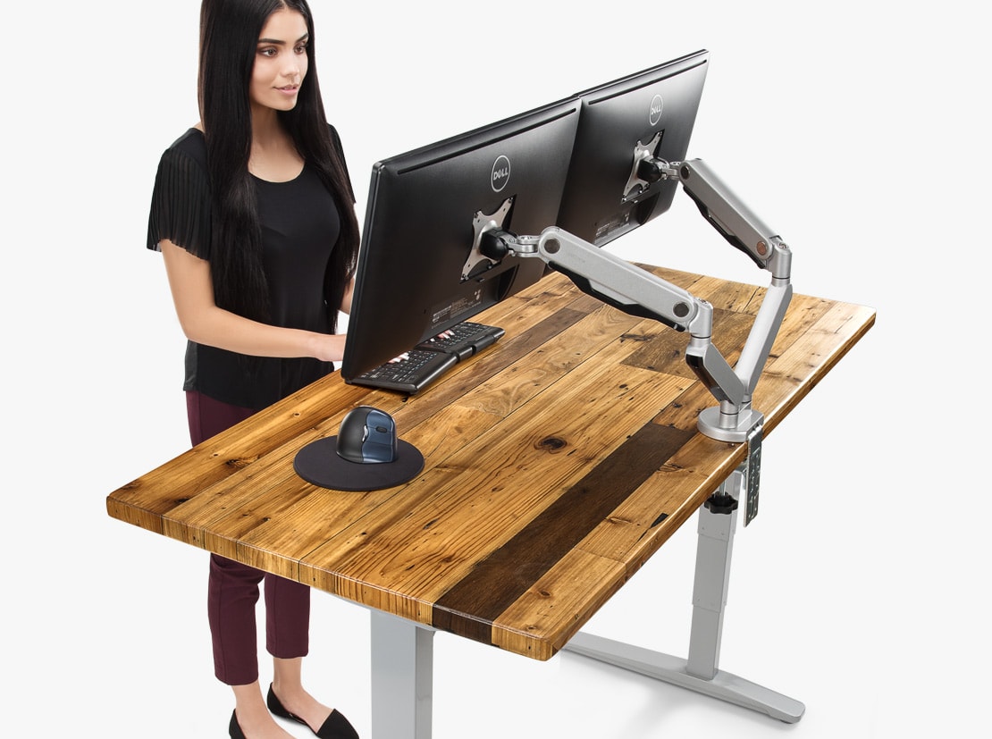 a completely height-adjustable desk with a desk made of reclaimed wood JQOOXNC