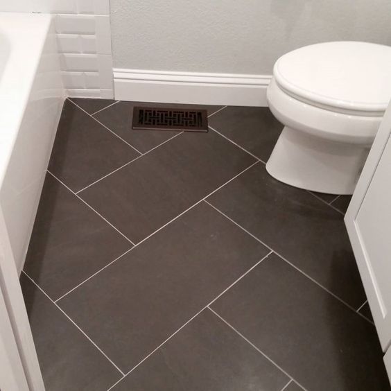 Bathroom tiles 12x24 tiles bathroom floor.  could use the same tile but a different design on MGJPMIK