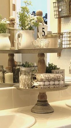 Ideas for tiered trays in the bathroom.  |  French country house bathroom, tray decor.