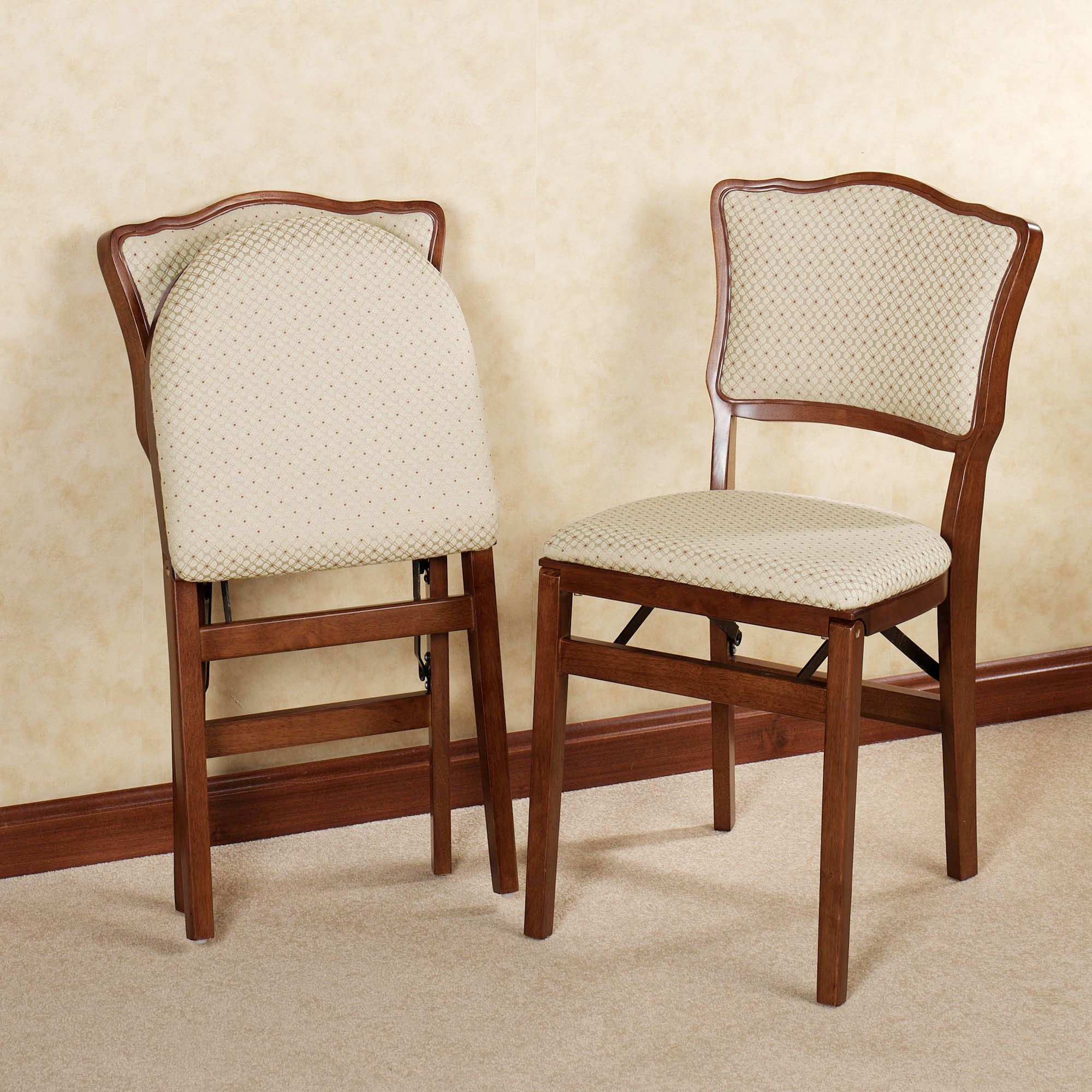 Folding chairs you might also consider.  Dover Cane folding chair ... ELSTOFD