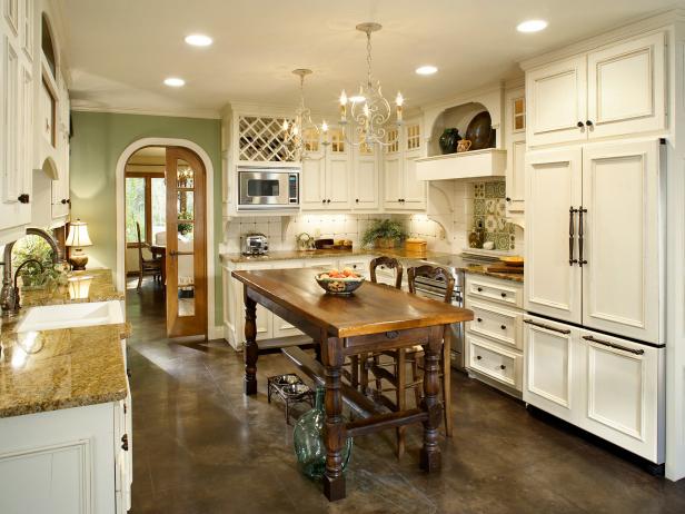 French country kitchen with white cabinets and chandeliers QHDFVQP