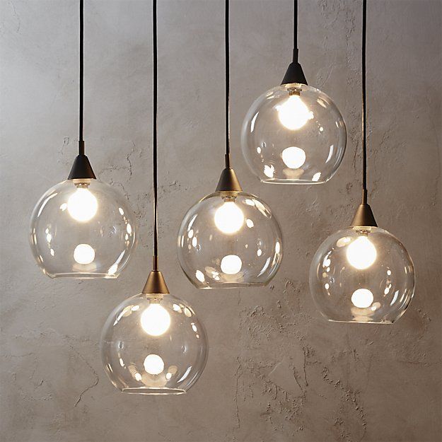 hanging lights to the power of five.  industrial modern chandelier hangs five glass balls by blacku2026 TIEQGIL