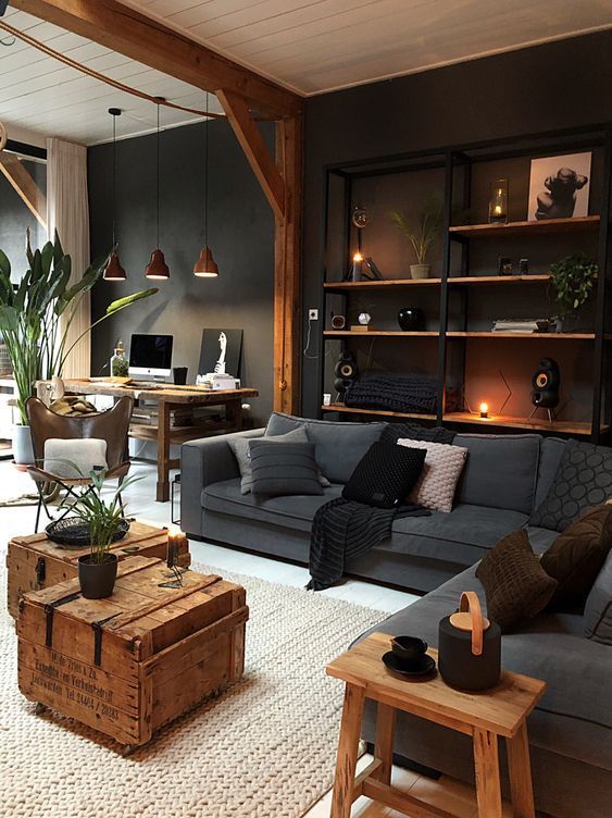 Male industrial living room with a wall shelf.