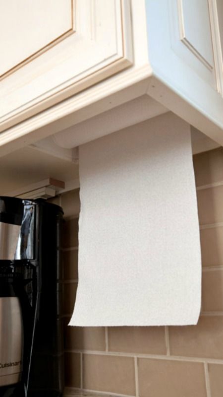Cabinet paper towel holder ... Great idea!  |  Kitchens at home.