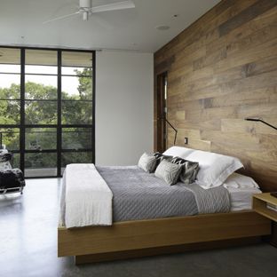 Example of a modern bedroom design for a minimalist concrete floor and a gray floor bedroom design in DNZJRIT