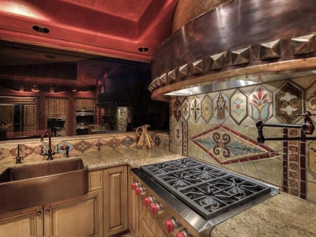 Southwestern Range Hood & Tile Mirror |  Nice kitchens.