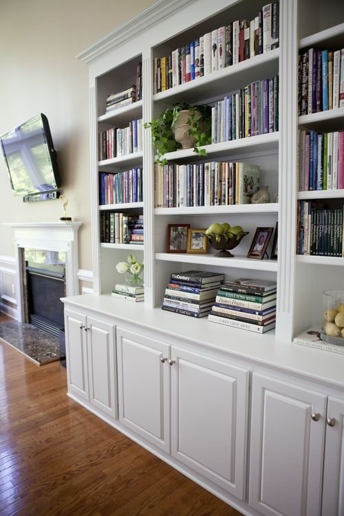 white bookcase with doors RTSQXPQ