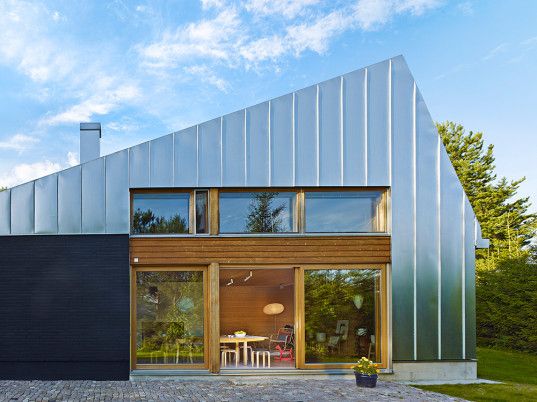 The metal clad house L is a contemporary holiday spot in Finland.