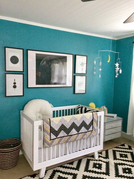 Turquoise kids room design with yellow, black and white accents.