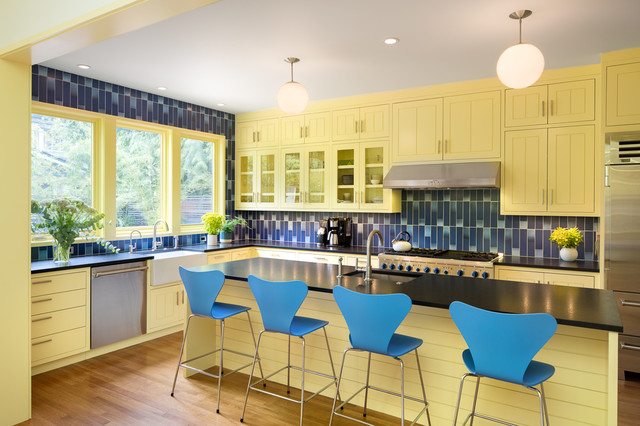 Cheerful yellow and blue kitchen for book love