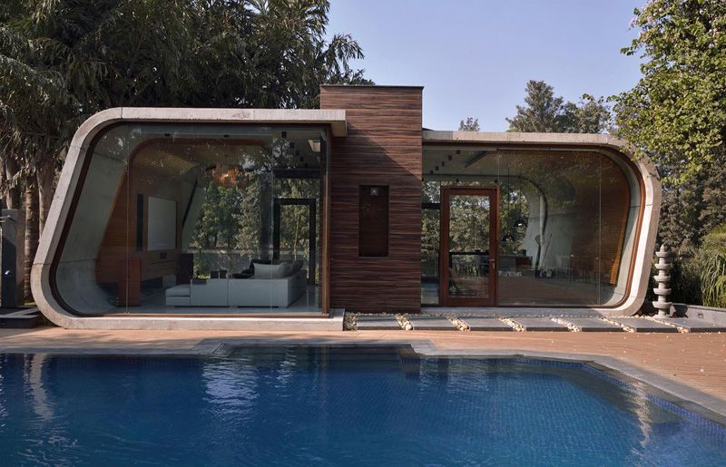 Curved Concrete Cabanas |  Modern pool house, prefab.