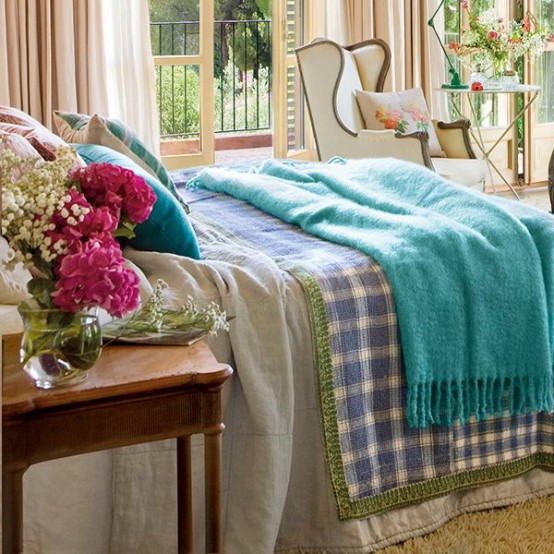Charming vintage bedroom design with turquoise and pink accents.