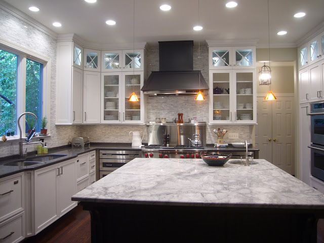 A kitchen makeover |  White granite countertops, gray kitchen.