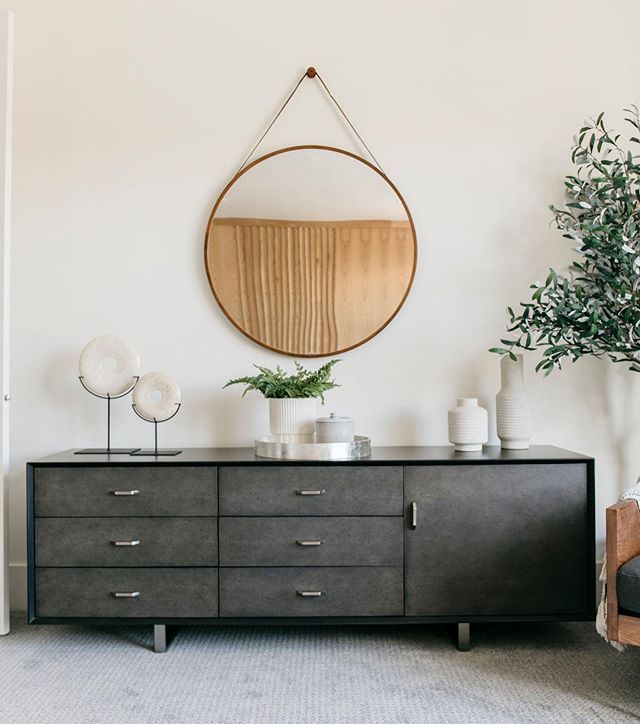 How to style a dresser in 2020 |  Home decor, stack of books.