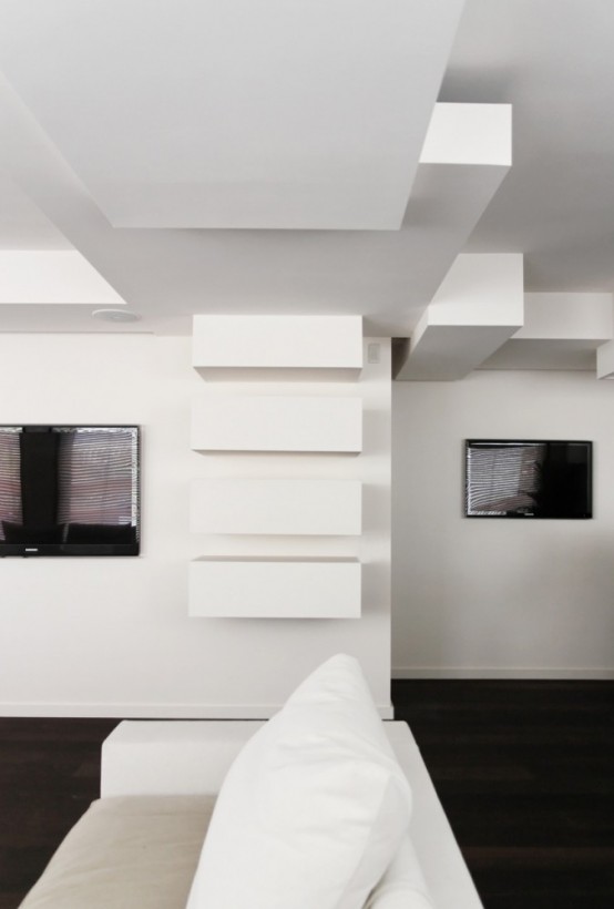 Monochrome duplex apartment with complex interior geometry - DigsDi