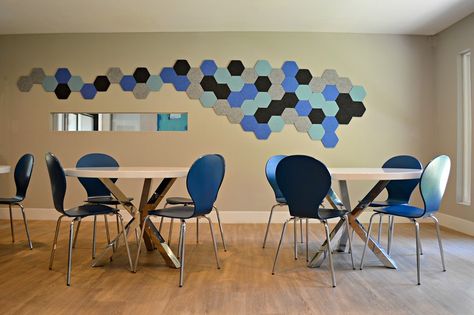 EchoPanel Geometry Hex Tiles Blue and Gray complement the seating in.