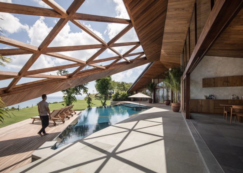 Carbon House with a sculptural roof over the patio - DigsDi
