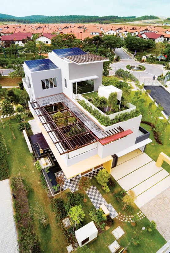 Tropical house design with cool roof garden and canopy - Setia.