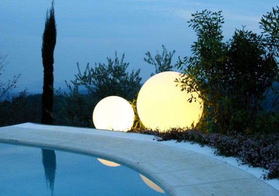 Charming garden and pool lighting with a slide - DigsDi