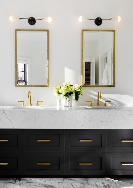 Gold and Black Bathroom with Gold Studded Medicine Cabinets.