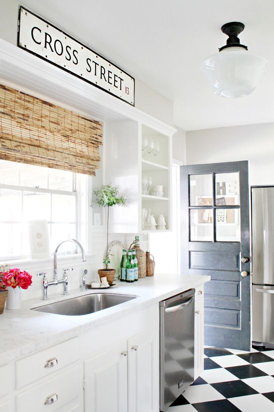 I love a white kitchen of any style.  They always seem like that.