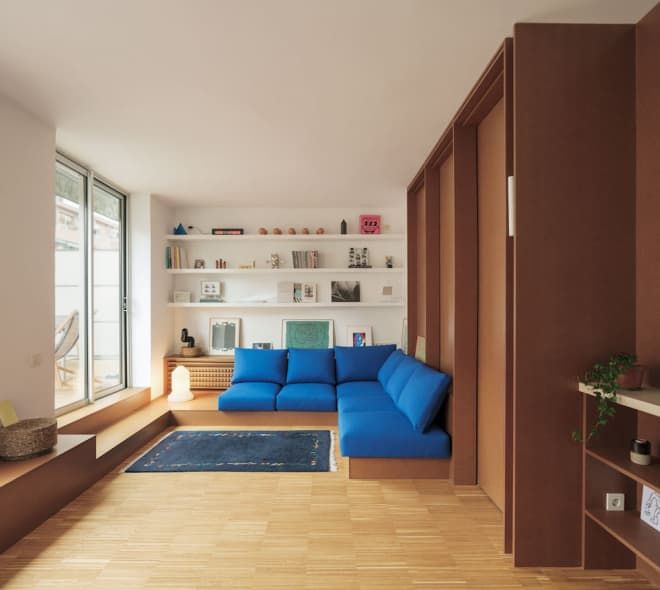 A top floor apartment in Barcelona comes with built-in furniture.