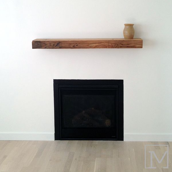 Fireplace cladding made from reclaimed wood ... and looks up.