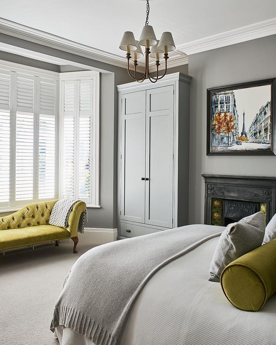 A gray bedroom brightened with pistachio accents to make it stand out.