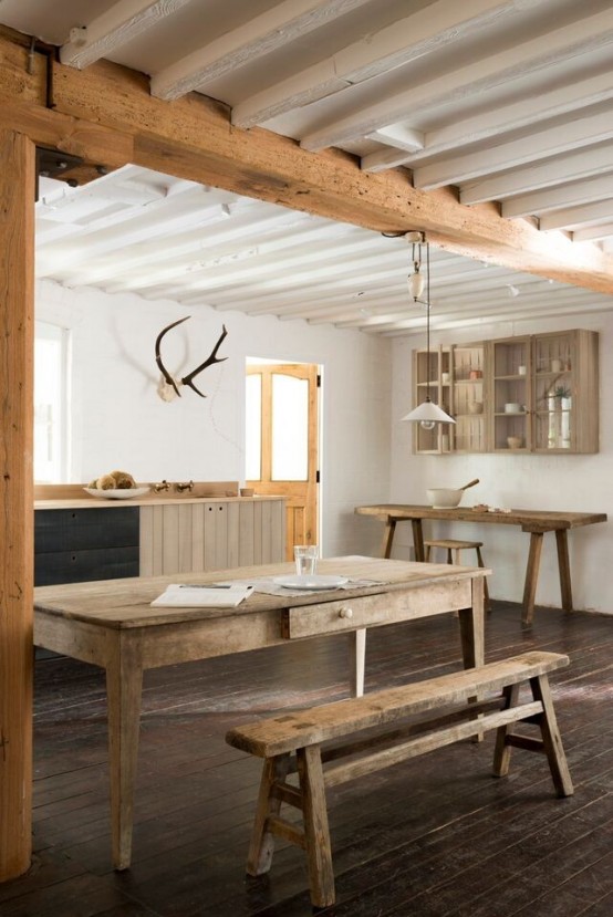 Rustic kitchen with an extensive use of rough wood - DigsDi