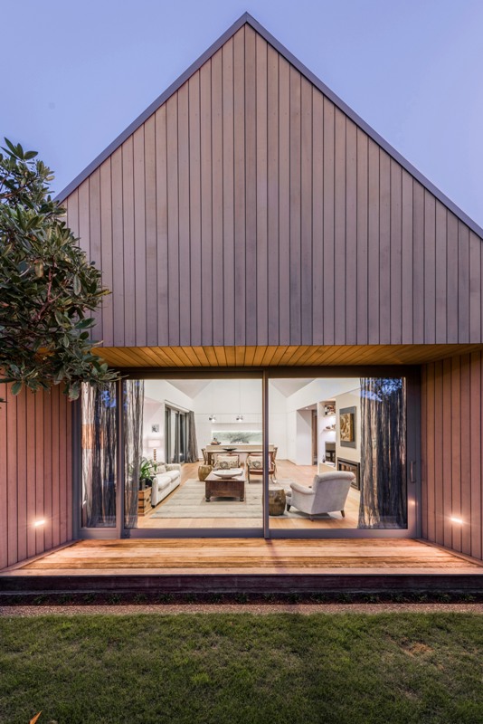 Modern Cedar Clad Home Divided by Courtyards - DigsDi