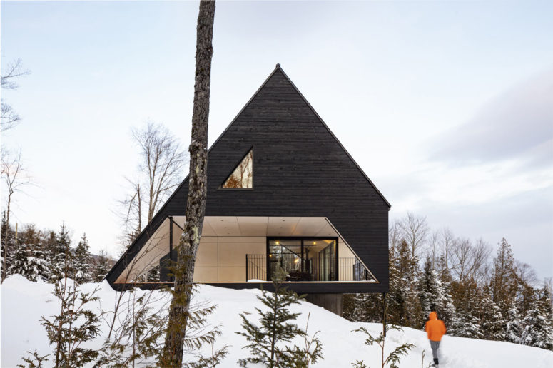 A frame cabin on a steep slope