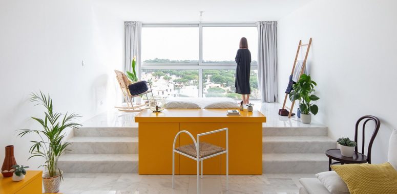 Minimalist Studio Apartment with Bright Yellow Touches - DigsDi