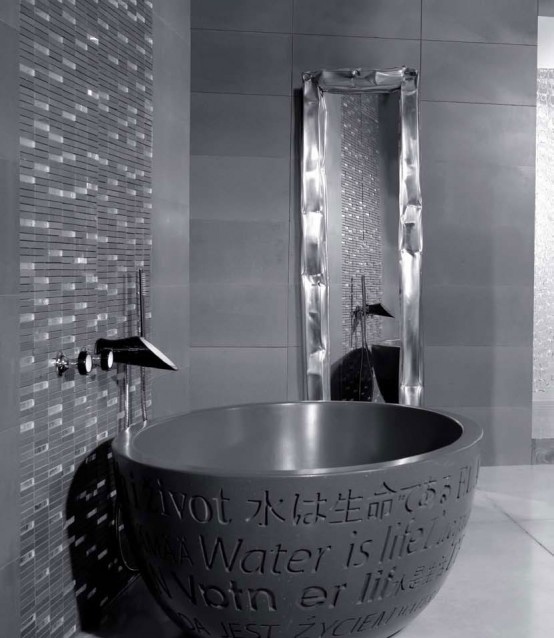 Black and white bathroom faucets and shower heads by Bongio