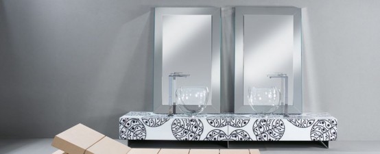 Clear glass bathroom vanity with floral motif by Cogliati Cogliati