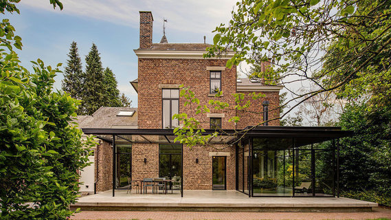 This Flemish style home in Belgium offers a very modern addition.